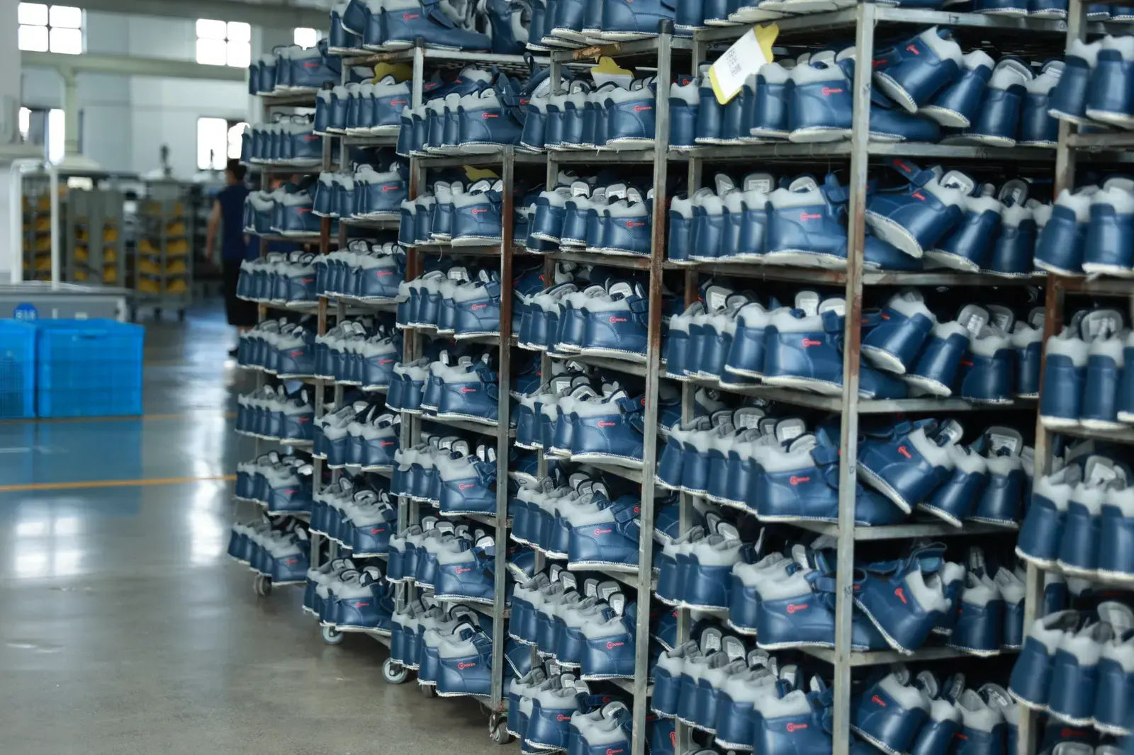 Assembled footwear uppers arranged for production